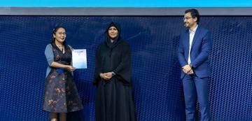 Maral Bayaara receiving the Prototypes for Humanity award